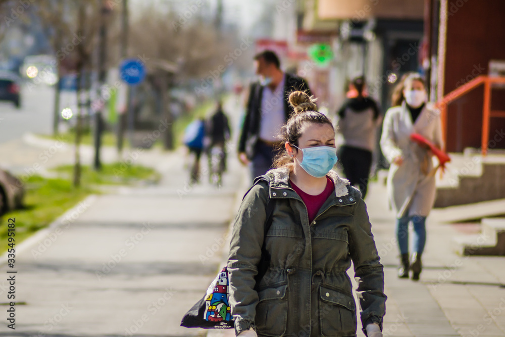 Fototapeta premium Novi Sad, Serbia - April 03. 2020: Activities people in Novi Sad during the virus Covide-19 