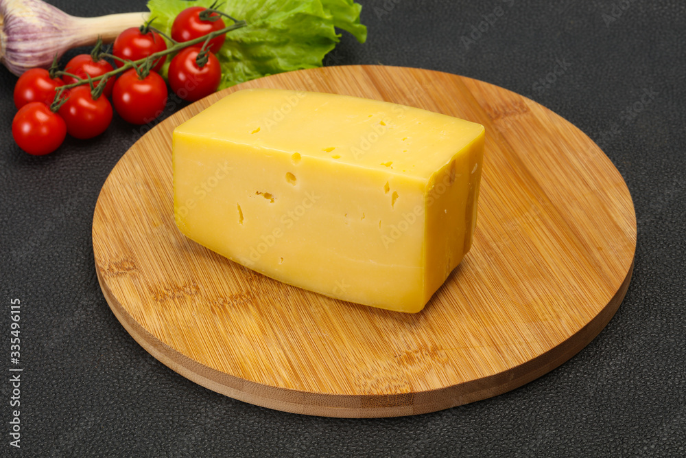 Hard yellow tasty cheese brick Hard yellow tasty cheese brick