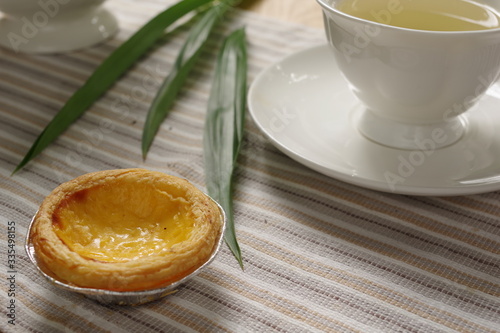 A delicious homemade custard tart with earl grey in the afternoon tea.
