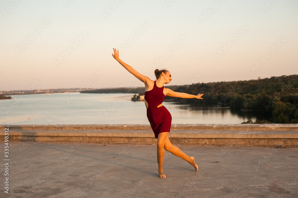 girl dancer while dancing in the summer outdoors girl dancer while dancing in the summer outdoors
