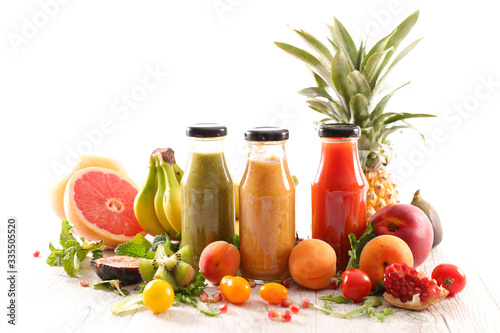 Fototapeta Naklejka Na Ścianę i Meble -  colorful healthy smoothies and juices in bottle