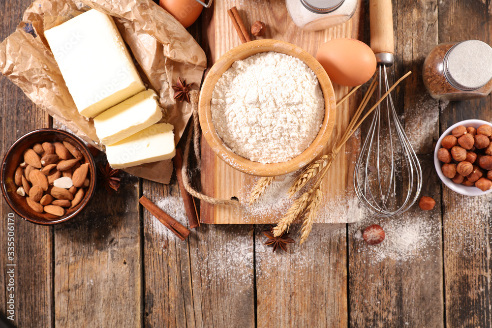 baking food ingredient with flour, egg, butter and nuts baking food ingredient with flour, egg, butter and nuts