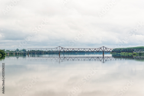 Šabac, Serbia - June 01, 2019: The Old Bridge (Serbian: Stari most) is a famous bridge over the Sava River in Sabac. For road transport it was put into operation in 1932, and for railway in 1934. © nedomacki