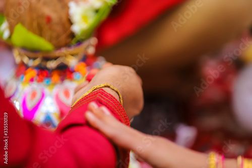 Indian wedding photography, Haldi ceremony groom hands