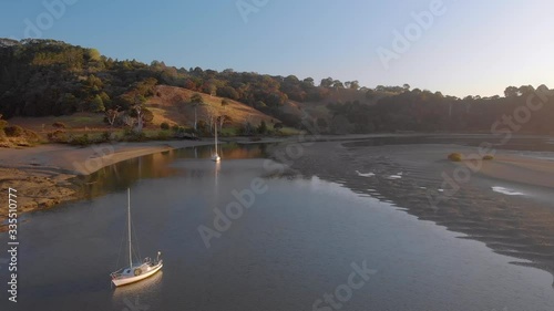 Flying up Puhoi river, Wenderholm, New Zealand photo