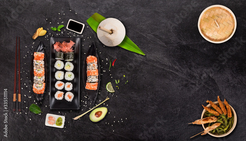 Top shot of Japanese sushi on black concrete background