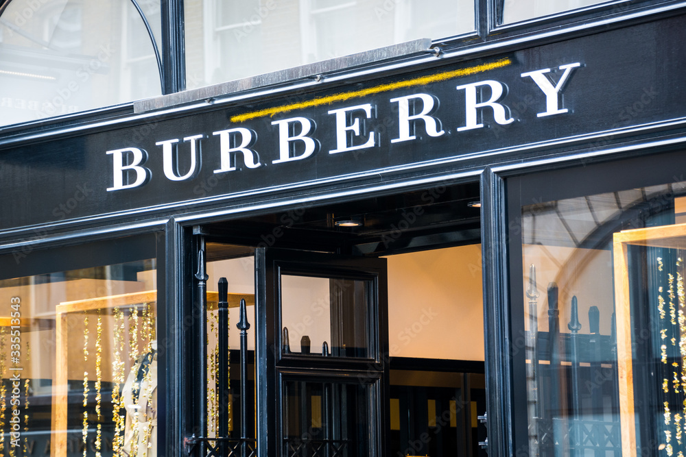 LONDON- MARCH, 2019: Burberry store logo in Covent A luxury British fashion brand Stock Photo | Adobe Stock