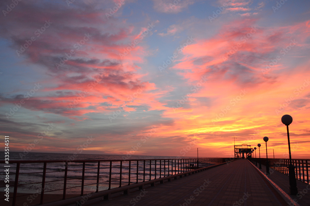 sunset on the sea pier