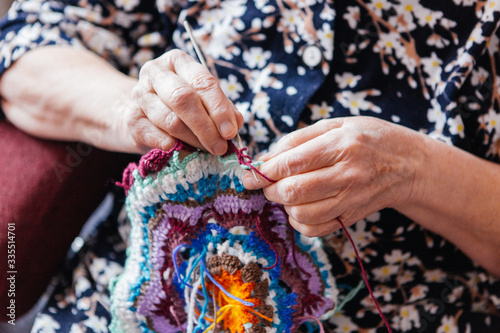 Grandma crochets things.Hands close up