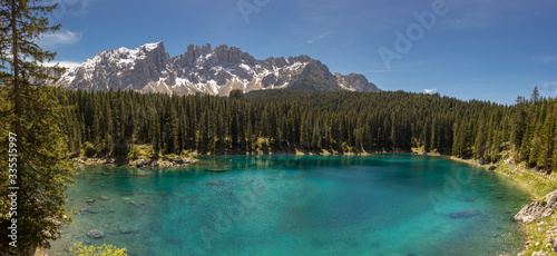 Landscape of Carezza lake (Lago di Carezza, Karersee) with Mount Latemar in the Dolomites mountains, Bolzano province, South tyrol, Italy.