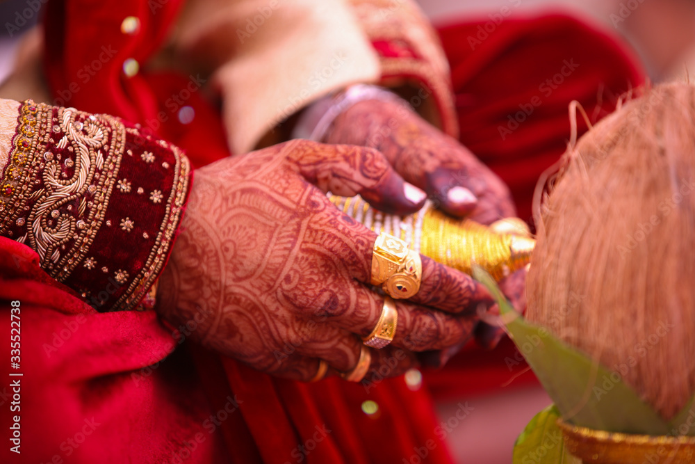 Traditional indian wedding ceremony, groom hand