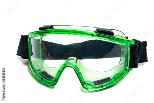 green safety glasses for doctors, isolate on white background