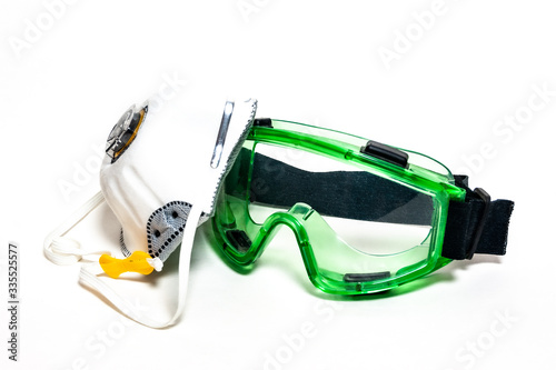 Protection Mask with Glasses against dust and corona viruses placed on a white background.
