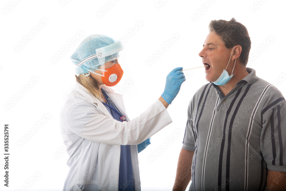 Healthcare worker swabbing a patient for respiratory viruses COVID-19 or flu Healthcare worker swabbing a patient for respiratory viruses COVID-19 or flu