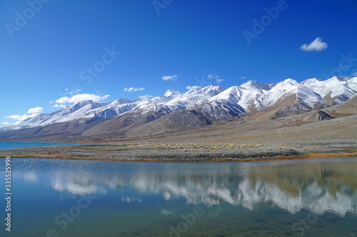 Nature Scene of Landscape Pangong tso or Pangong blue Lake with mountain background at Leh Ladakh  Jammu and Kashmir   India - Travel and Sightseeing                               