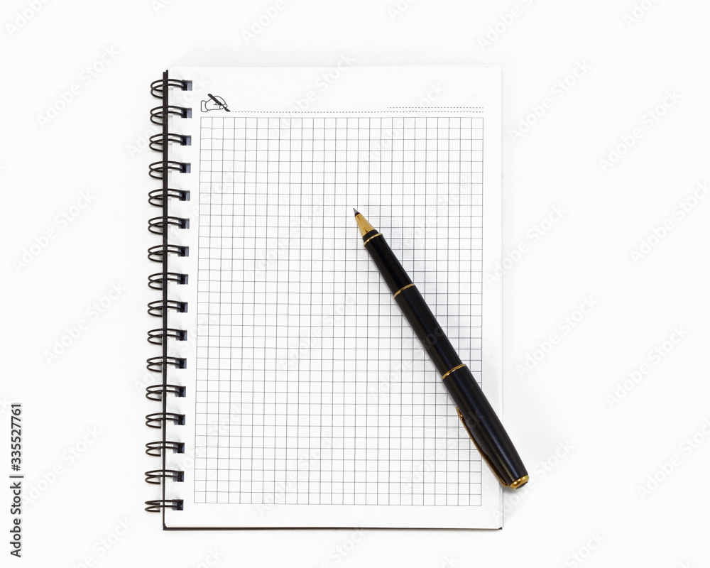 Empty stylish spiral Notepad for notes and a beautiful corporate pen on a white background. Empty space. Stylized stock photos. The view from the top. Empty stylish spiral Notepad for notes and a beautiful corporate pen on a white background. Empty space. Stylized stock photos. The view from the top.