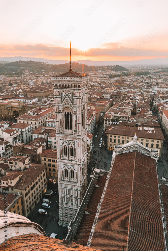 Florence cityscape and Campanile from Santa Maria del Fiore Duomo at sunset