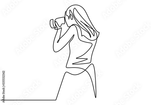 A girl taking photo with her camera. She is photographer. She like taking every moment with her camera. One line continuous. Vector illustration