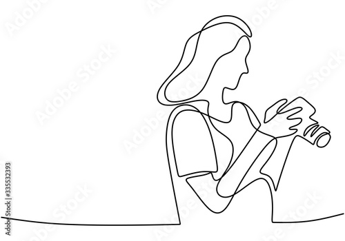 A girl taking photo with he...