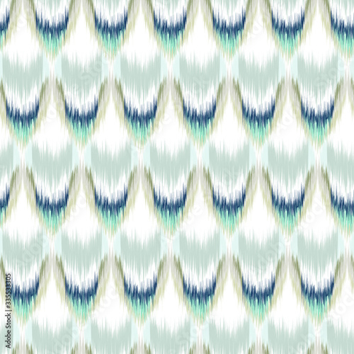 Ikat seamless colorful geometric pattern. Abstract background texture.