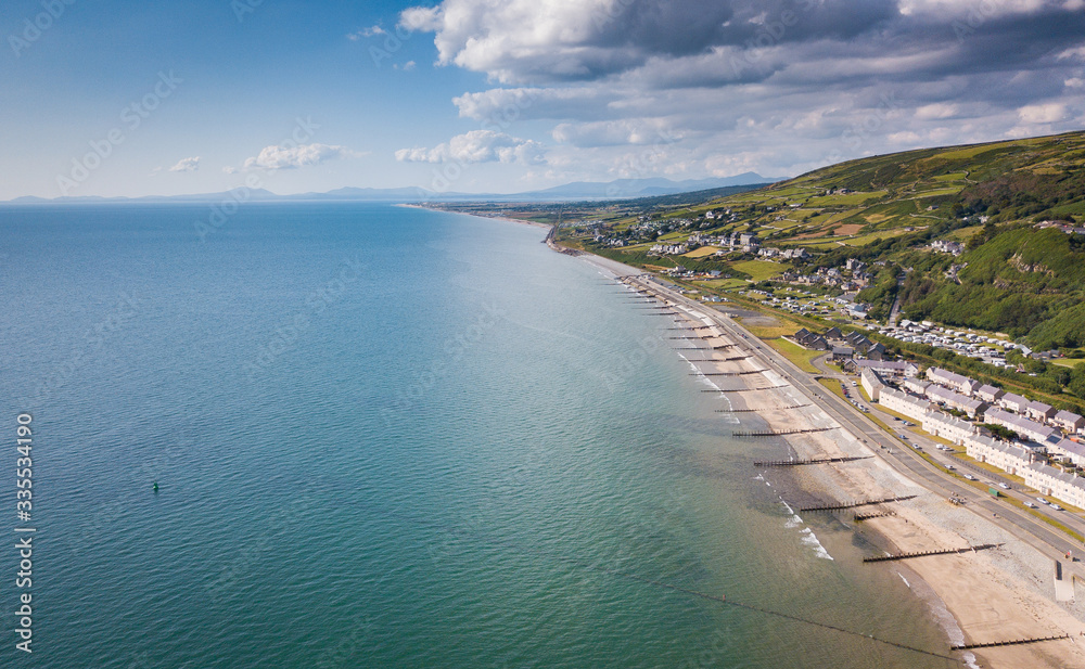 Aerial view of Barmouth Beach and Llyn Peninsula in background, Snowdonia, Wales, UK
