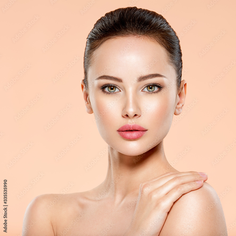 Portrait of beautiful girl which touching her fresh face. Closeup face of young woman with clean skin. Skin care. Portrait of beautiful girl which touching her fresh face. Closeup face of young woman with clean skin. Skin care.