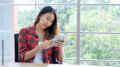 Stay home, social distancing, Happy young asian woman using digital tablet at home, Asia girl study online education, e commerce, online business, e learning, work from home Free Download Stay home, social distancing, Happy young asian woman using digital tablet at home, Asia girl study online education, e commerce, online business, e learning, work from home - GFXLoad