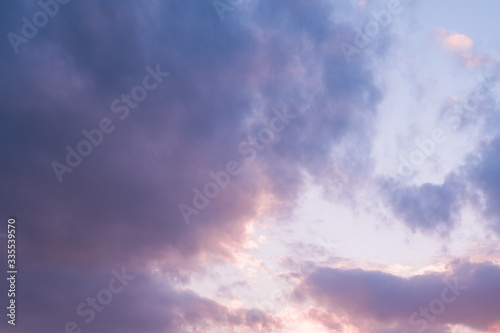 sunset sky with large cumulus clouds, purple, pink, lilac, blue colors