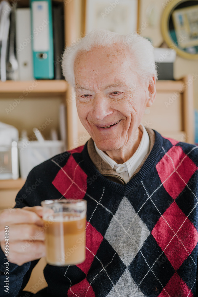 Portrait of happy senior drinking coffee Portrait of happy senior drinking coffee