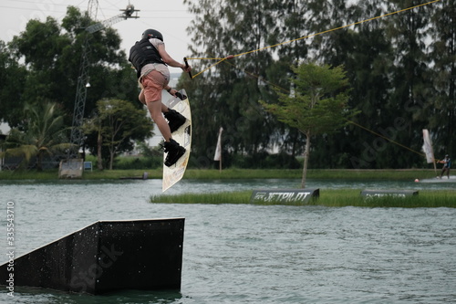 Young athlete Of Thailand is practicing sportWater Board at the wake park canal 6 on October 7, 2018. photo