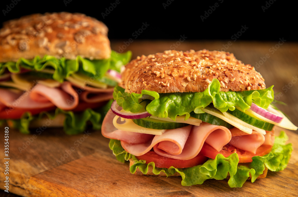 
Ham and cheese sandwich on a wooden table