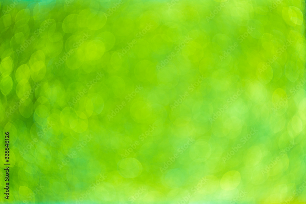 Obraz premium Green bokeh abstract background,Green Abstract Shiny Background