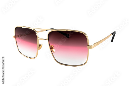 Red pilot aviator gold rimmed gradient sunglasses isolated on white background, side view