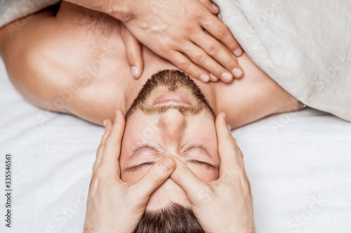 Man enjoying head massage.