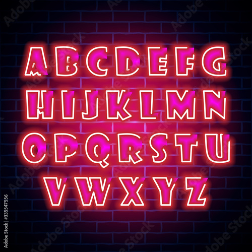 Neon light alphabet on blue brick wall background