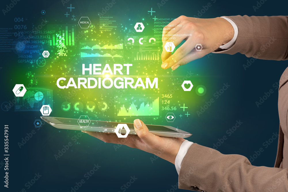 Close-up of a touchscreen with HEART CARDIOGRAM inscription, medical concept Close-up of a touchscreen with HEART CARDIOGRAM inscription, medical concept