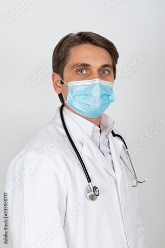 Handsome physician with mask