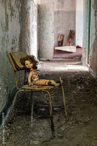 Fototapeta Naklejka Na Ścianę i Meble -  Abandoned doll in Chernobyl/Pripyat in the Exclusion Zone