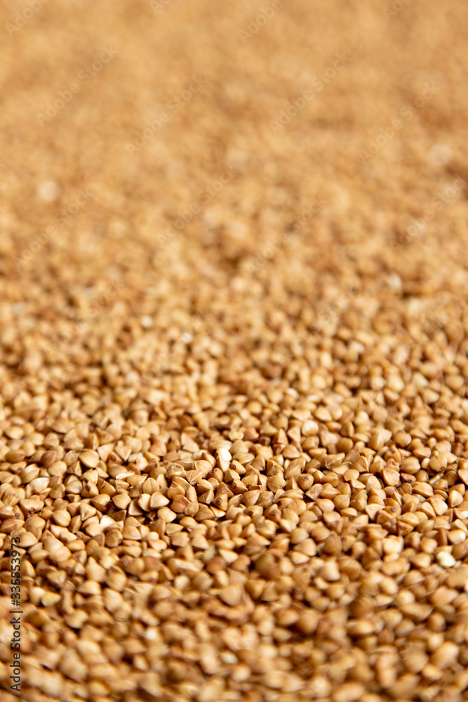 Buckwheat background, shallow depth of field, blur background. Concept - stocks before the covid-19 epidemic Buckwheat background, shallow depth of field, blur background. Concept - stocks before the covid-19 epidemic