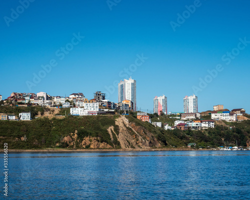 Marine City Peyzad. City over the sea on a clear sunny day in the late warm autumn.