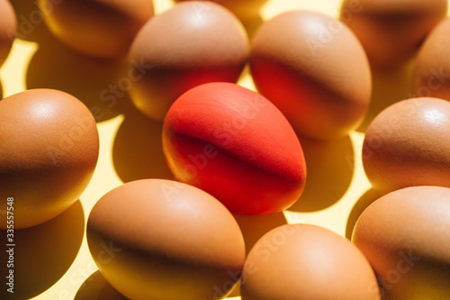 fresh chicken eggs on a yellow background. easter concept