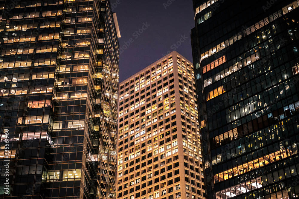 Fototapeta premium modern office buildings at night, cityscape