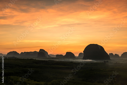 Limestone mountains and mist at dawn  Krabi