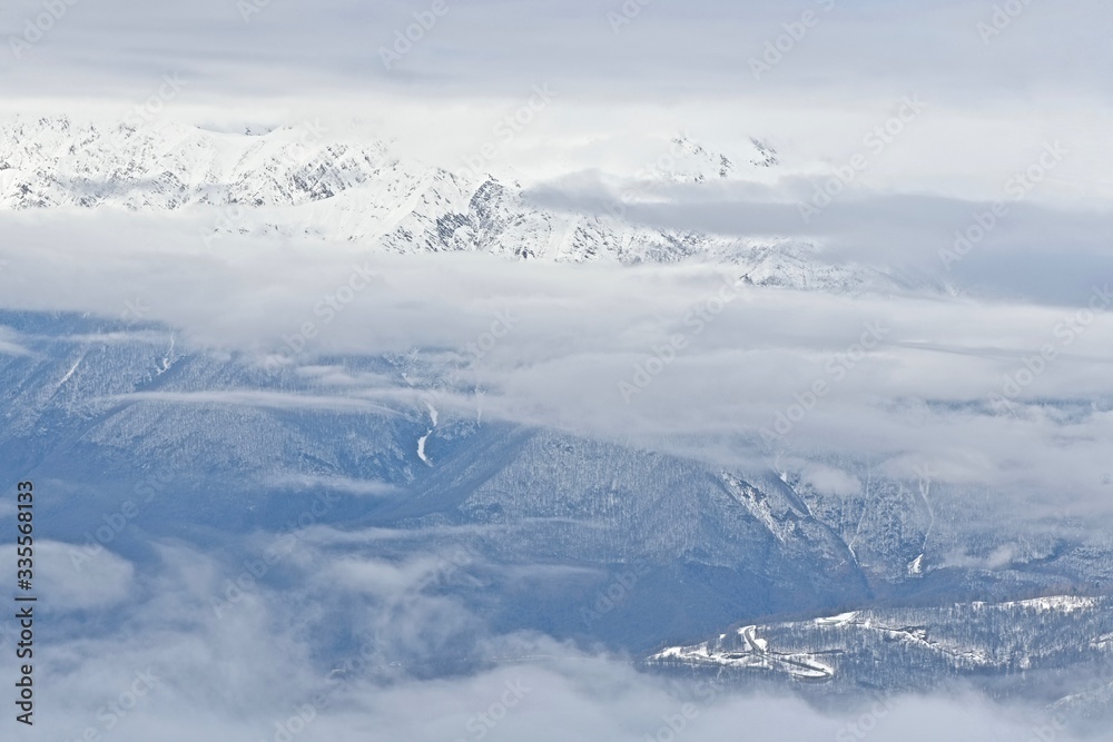 top view of clouds over mountain landscape