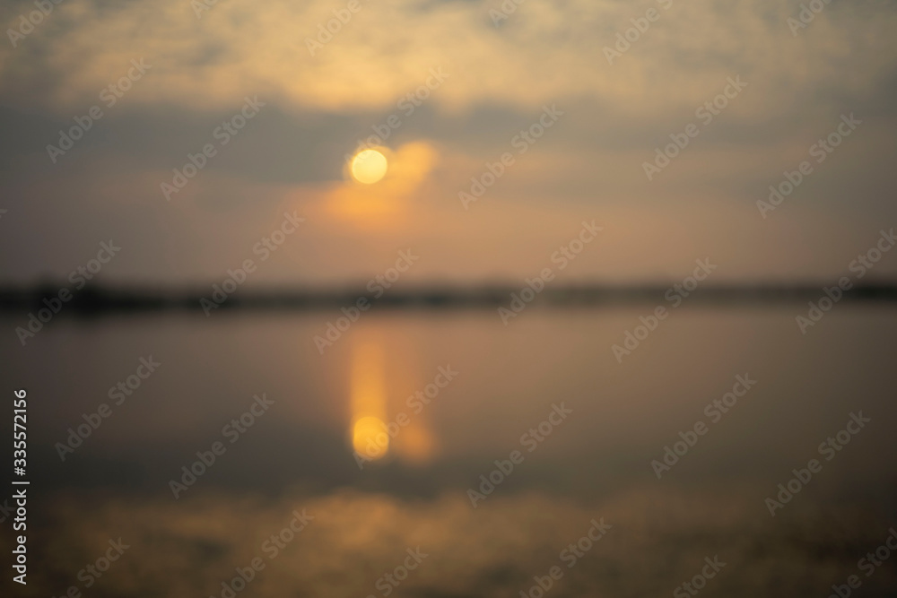 he morning sun hit the water surface. Unable to focus