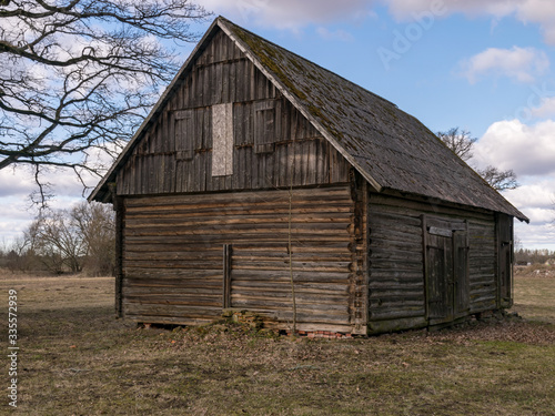 wooden sheds for storing firewood in the yard