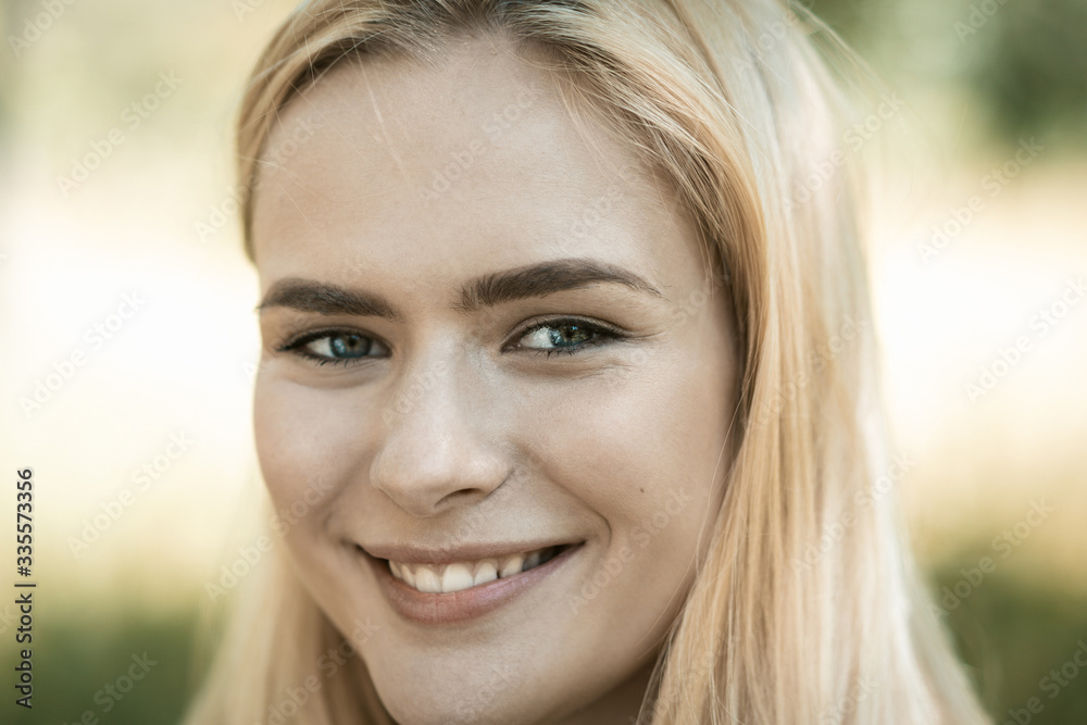 Smiling pretty Lady In Park Close Up Portrait Smiling pretty Lady In Park Close Up Portrait