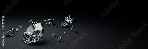 3D Rendering many size diamonds on dark gray  surface photo