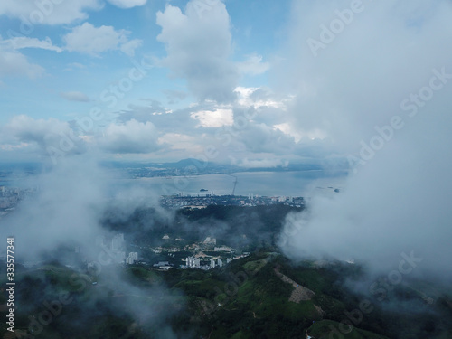 Aerial view Penang first bridge over cloud at Ayer Itam forest.