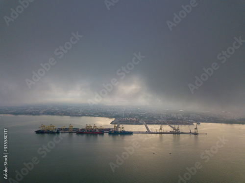 Aerial view North Butterworth Container Terminal (NBCT) over cloud in early morning.